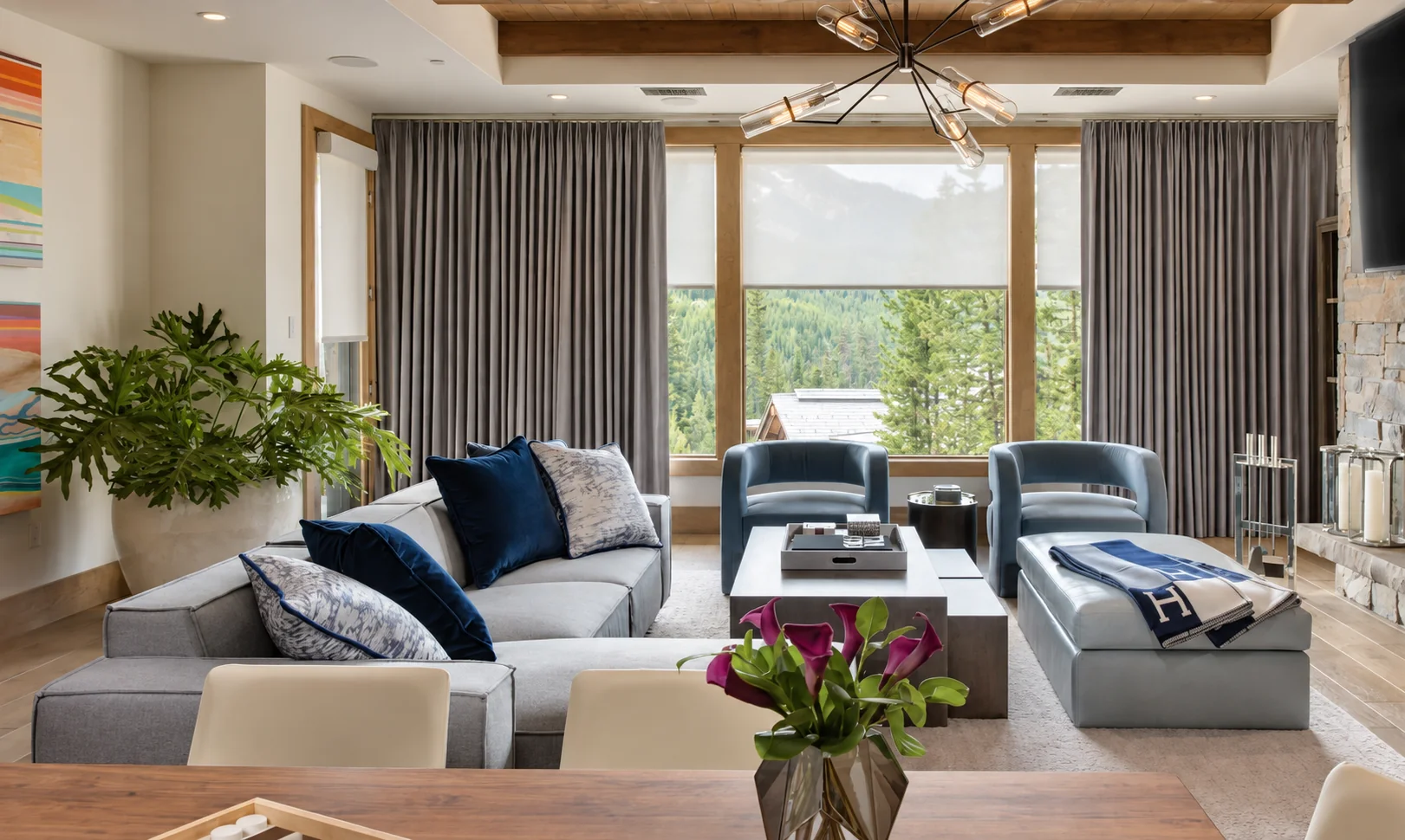 Illustrative living room with daylight softened at the windows
